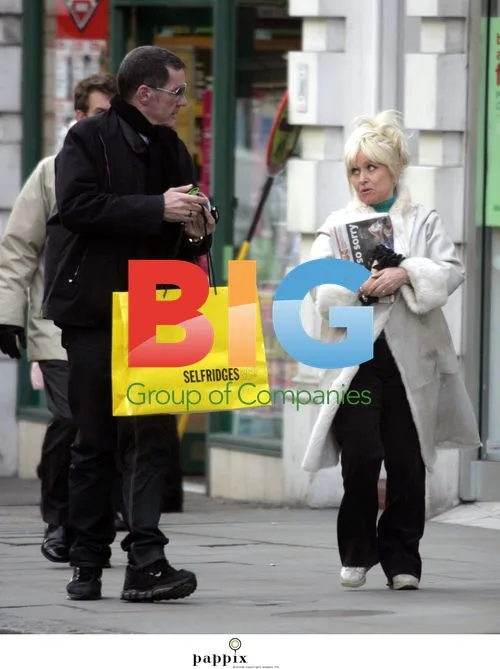Barbara Windsor and Dale Winton shopping