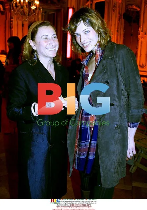 Miuccia Prada and Milla Jovovich at Miu Miu Fashion Show