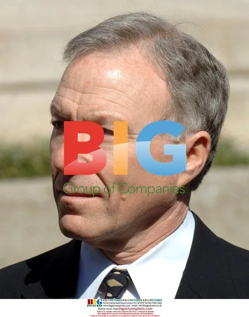 Scooter Libby listens to attorneys