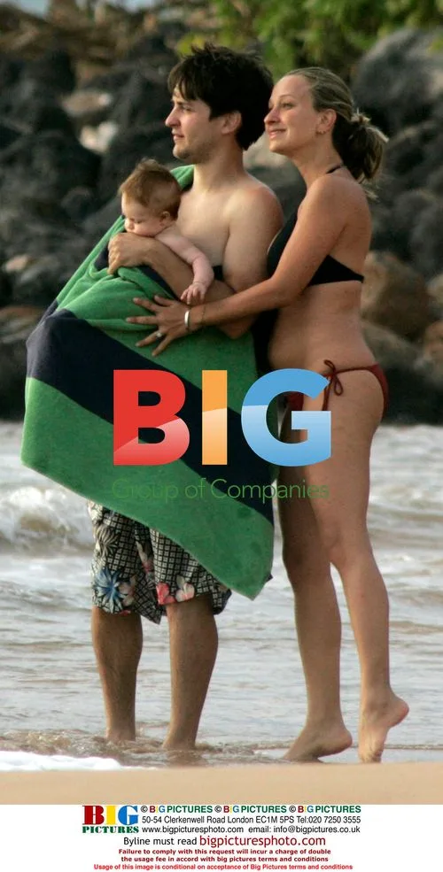 Tobey Maguire takes baby Ruby for a dip in Hawaii