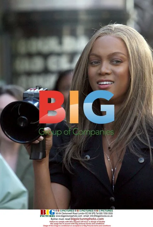 Tyra Banks Hugs Isaiah Washington at Movie Theater
