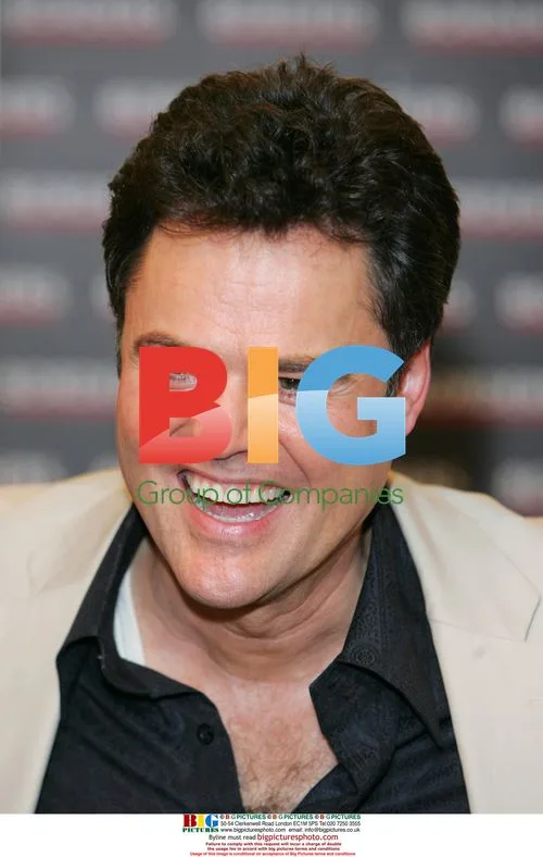 Donny Osmond Signs CD Copies