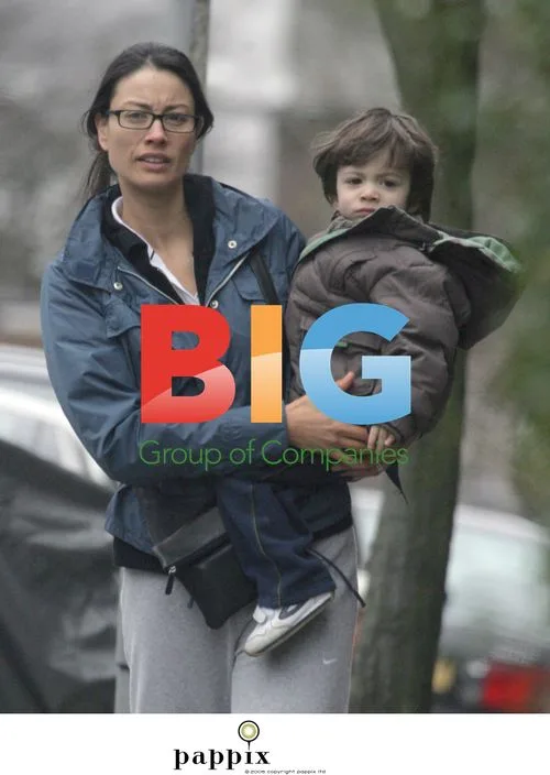 Melanie Sykes out with sons in London