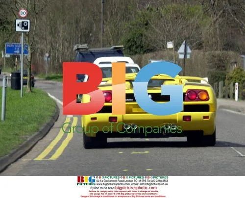 Rod Stewart drives his Lamborghini Diablo