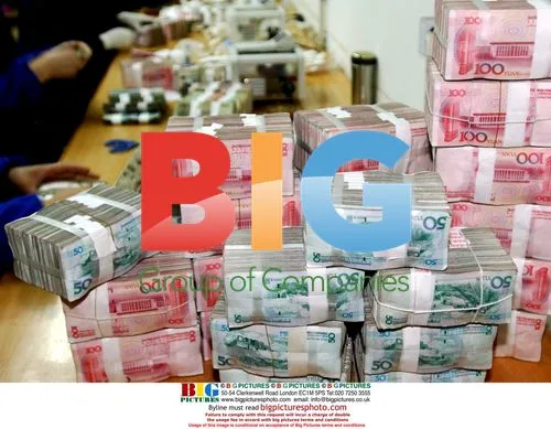 Chinese bank staff counting cash