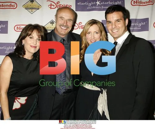 Dr. Phil McGraw, Heather Mills, and Jonathan Roberts at Starlight Gala