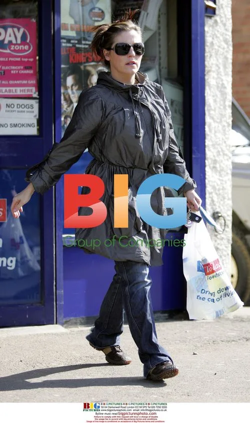 Jessie Wallace Wearing Sunglasses and Jacket