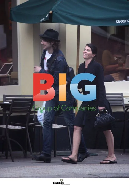 Sadie Frost and Alex Zane playful on London street