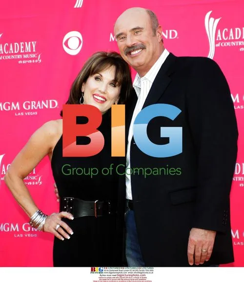 Robin McGraw and Dr. Phil at ACM Awards