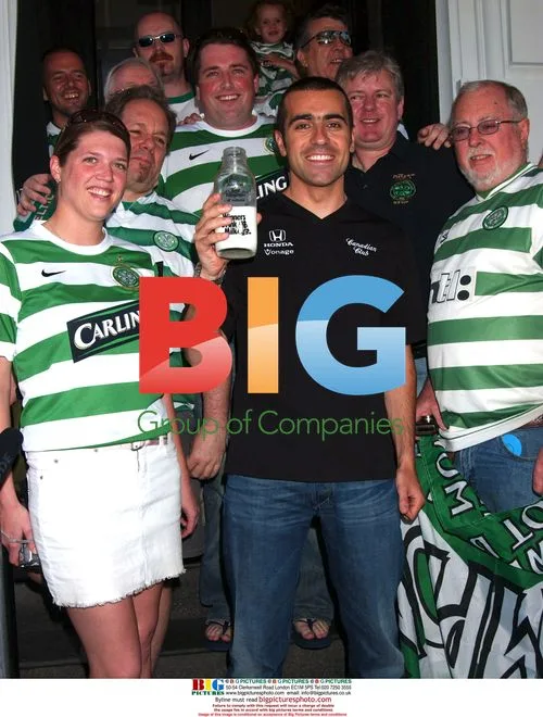 Dario Franchitti celebrates at NYC pub