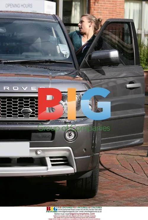 Wayne Rooney and Coleen Mcloughlin Return to Car