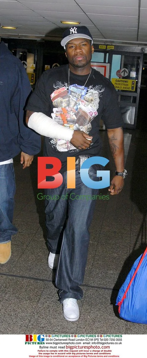 50 Cent Spotted at Dublin Airport with Bandaged Arm