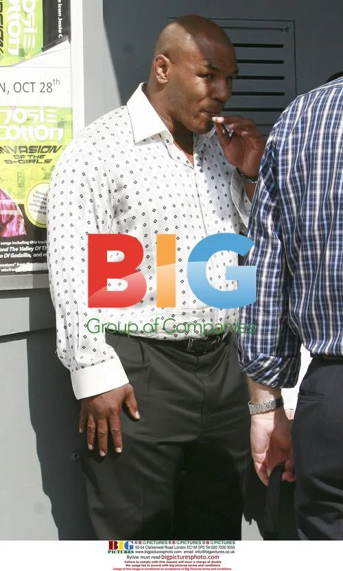 Mike Tyson Smoking Outside AA Meeting
