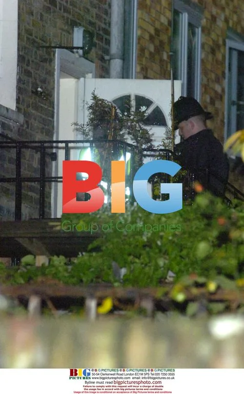Police at Amy Winehouse's Home