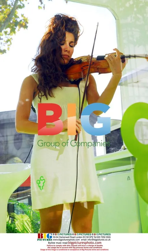 Spanish Violinist Patricia Arguelles in Glass Bubble