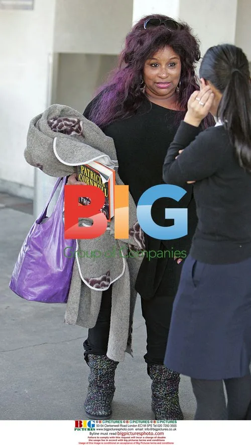 Chaka Khan at LAX with Purple Look
