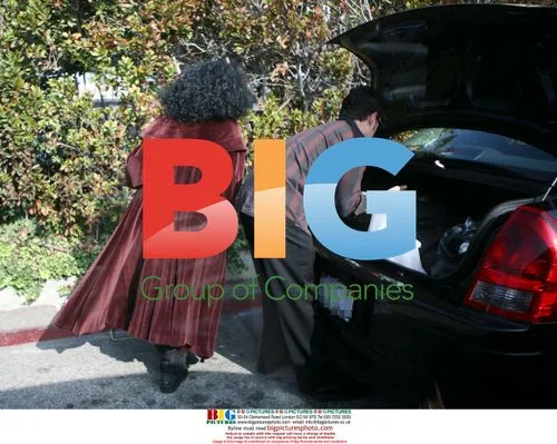 Diana Ross Dines Braless in Red Robe