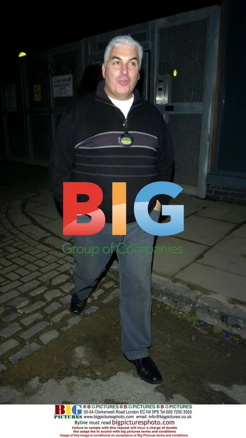 Amy Winehouse's Father and Manager Seen Leaving House