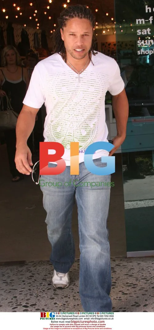 Cobi Jones and Girlfriend Shop and Stroll in Beverly Hills
