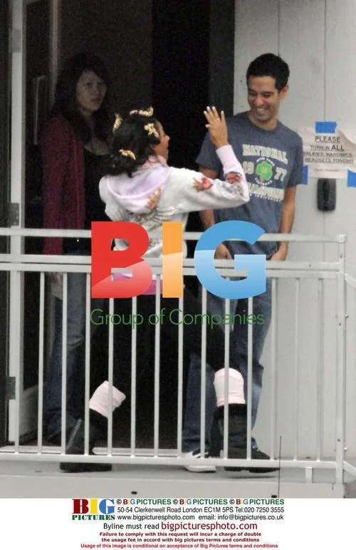Mel B Leaves Trailer with Rollers
