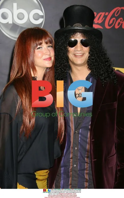 Slash and Perla at 35th American Music Awards