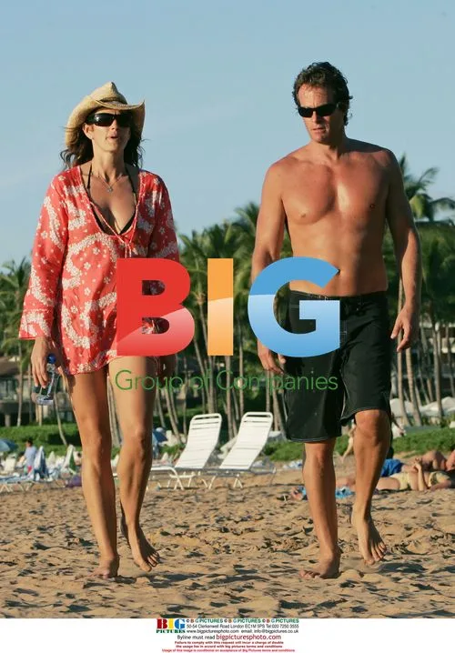 Cindy Crawford and Rande Gerber Walk on Beach