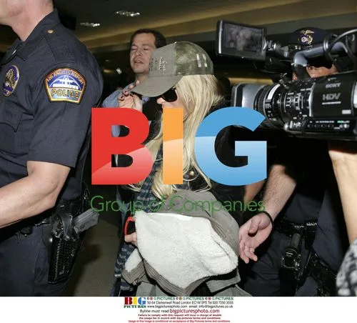 Lindsay Lohan Arrives at LAX