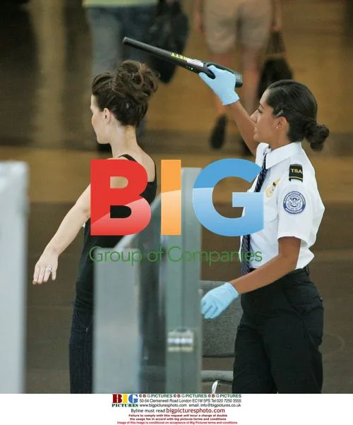 Kate Beckinsale Checked by Airport Security