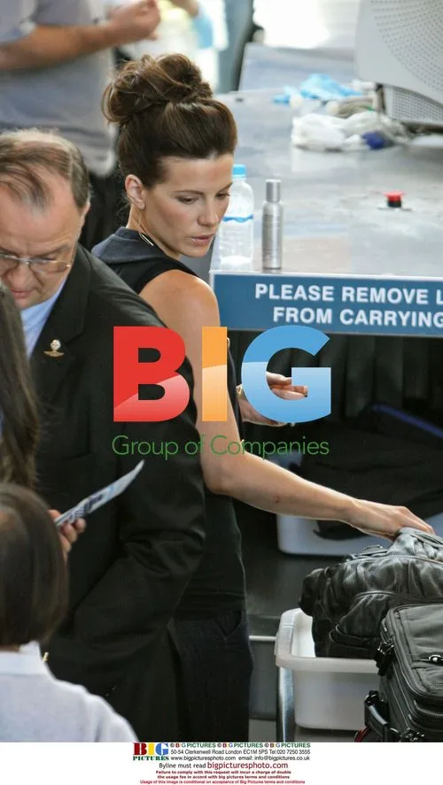 Kate Beckinsale Checked by Airport Security