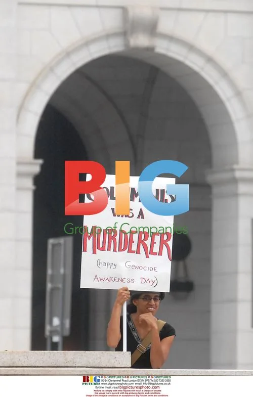 Protester Demonstrates Against Columbus Day