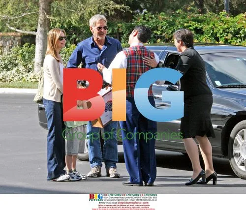 Harrison Ford with Calista Flockhart and son at Disneyland