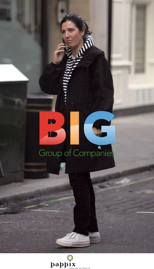 Sharleen Spiteri Clutches Gold Sneakers