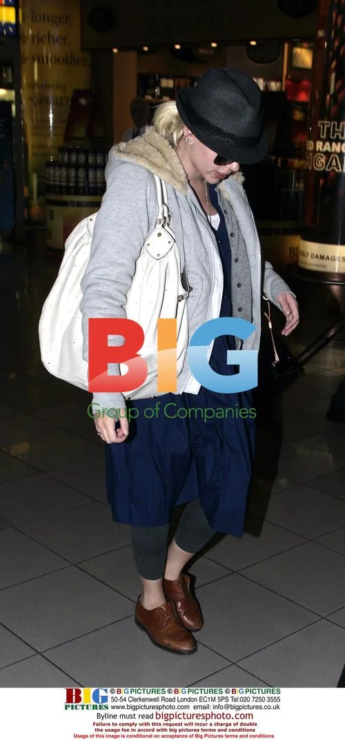 Scarlett Johansson Departs Heathrow