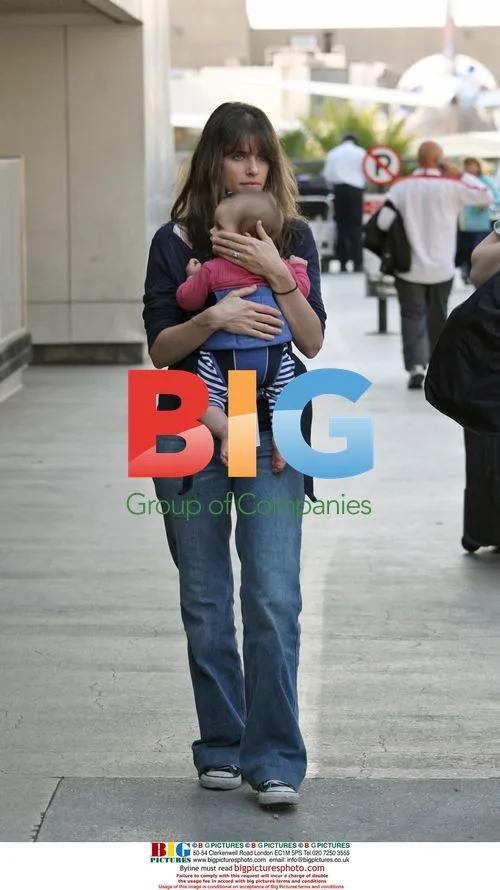 Amanda Peet and Daughter Arriving at LAX