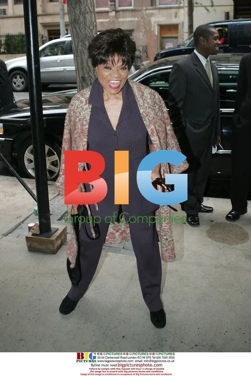 Eartha Kitt leaves building in New York