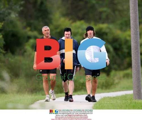 Liam Gallagher Jogs with Friends in Florida
