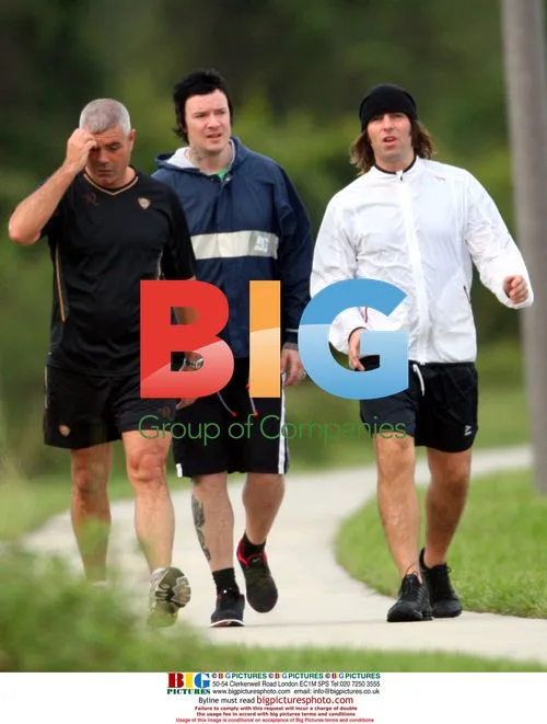 Liam Gallagher Jogging with Friends