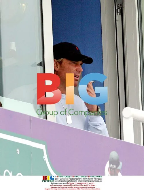 Shane Warne Arrives to Watch Cricket Match