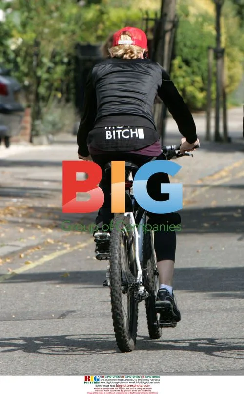 Madonna Leaves London Gym on Bike