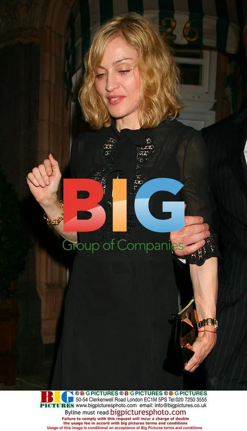 Madonna Exiting Harry's Bar in Mayfair