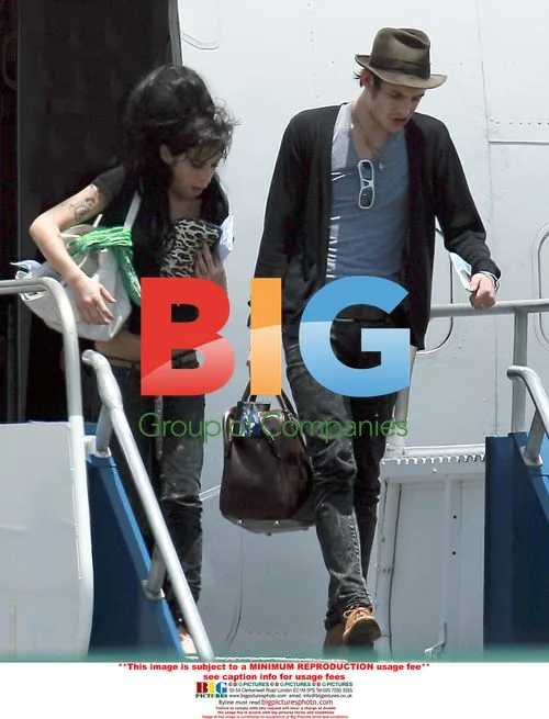 Amy Winehouse and Blake Fielder-Civil Arrive on Vacation