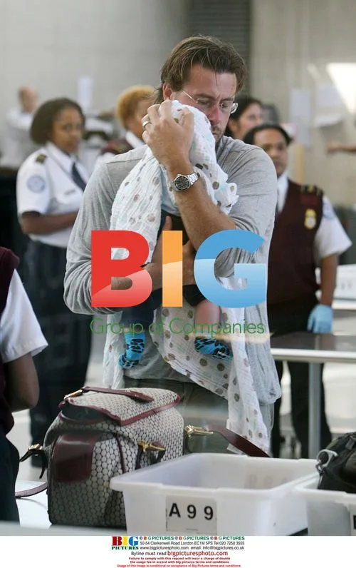 Tori Spelling, Dean McDermott & Son Liam at LAX