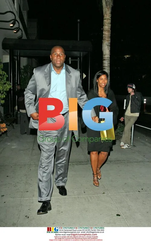 Magic Johnson and Cookie Kelly leave Mastro's Steakhouse
