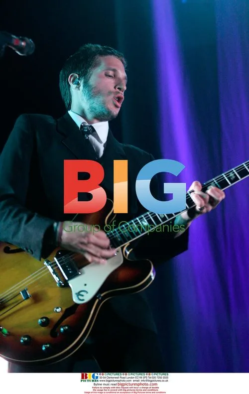 Daniel Kessler with Interpol in concert