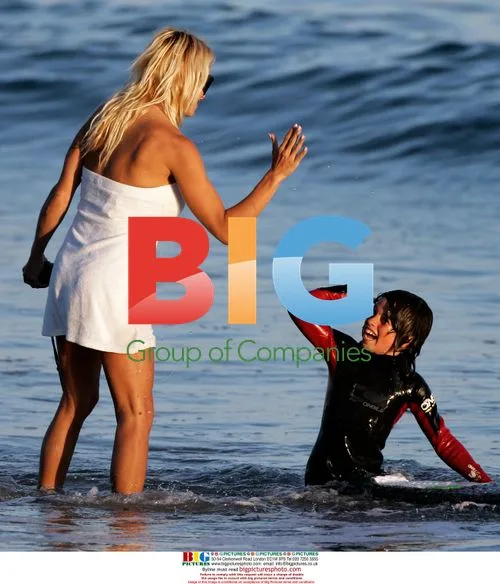 Pamela Anderson Relaxes on Beach with Son