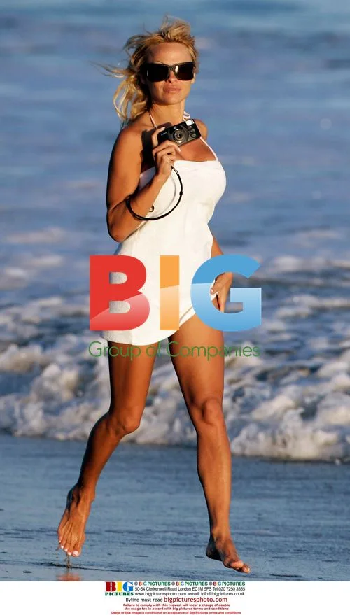 Pamela Anderson with son Brandon on the beach