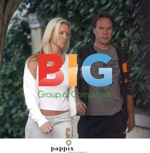 Caprice and John Hitchcox stroll in London