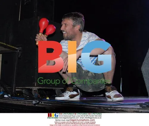 Happy Mondays Frontman Shaun Ryder Smokes on Stage
