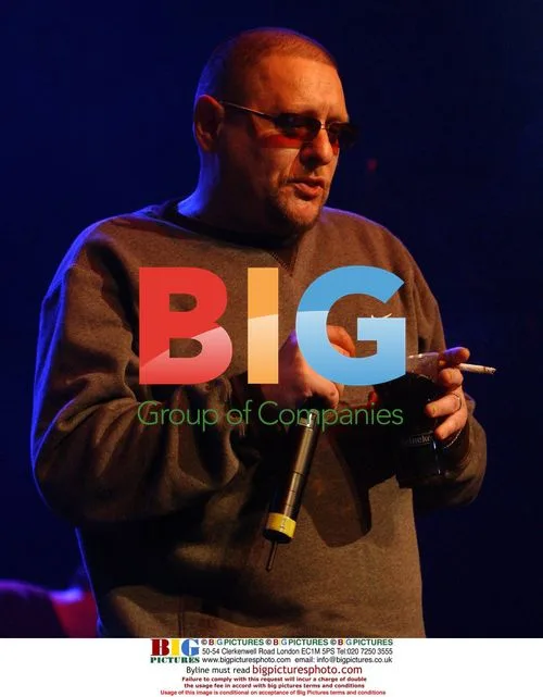Shaun Ryder of Happy Mondays Smokes Onstage