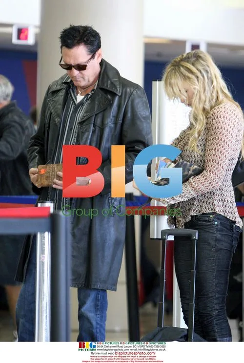 Michael Madsen and wife at LAX